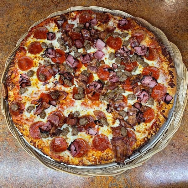ALL AMERICAN MEAT LOVERS Our original pizza topped with pepperoni, sausage, ham, and bacon baked to perfection.